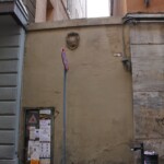 L'accesso (chiuso con muro e stemma del comune di Bologna) su Roma (oggi via Fossalta).